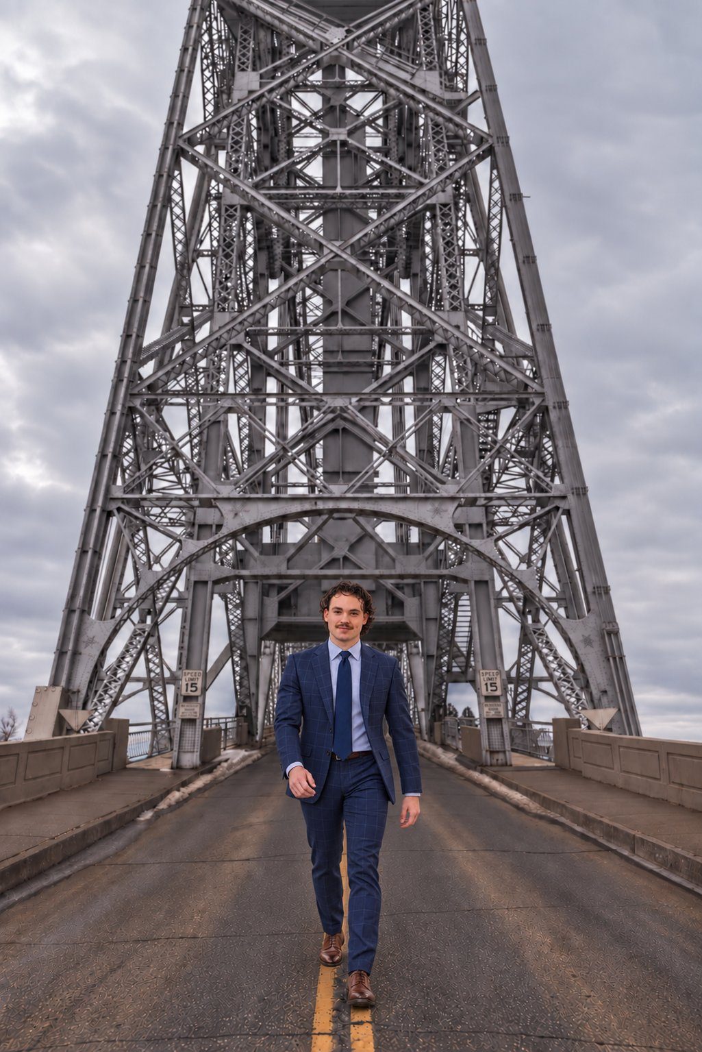 Kai Melton walking across the Aerial Lift Bridge in Duluth